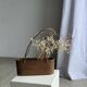Small oval basket with long handles, traditional Indonesian L28xH10