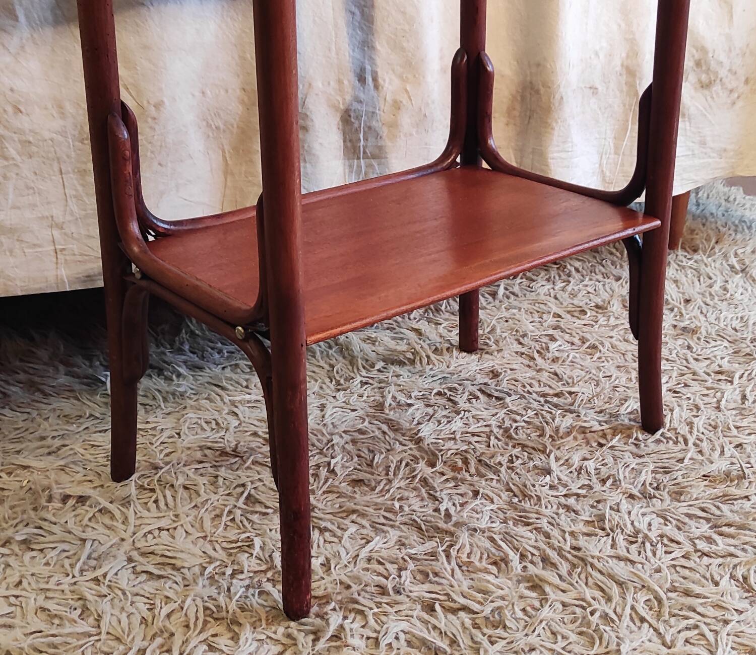 Curved solid wood side table - early 20th century