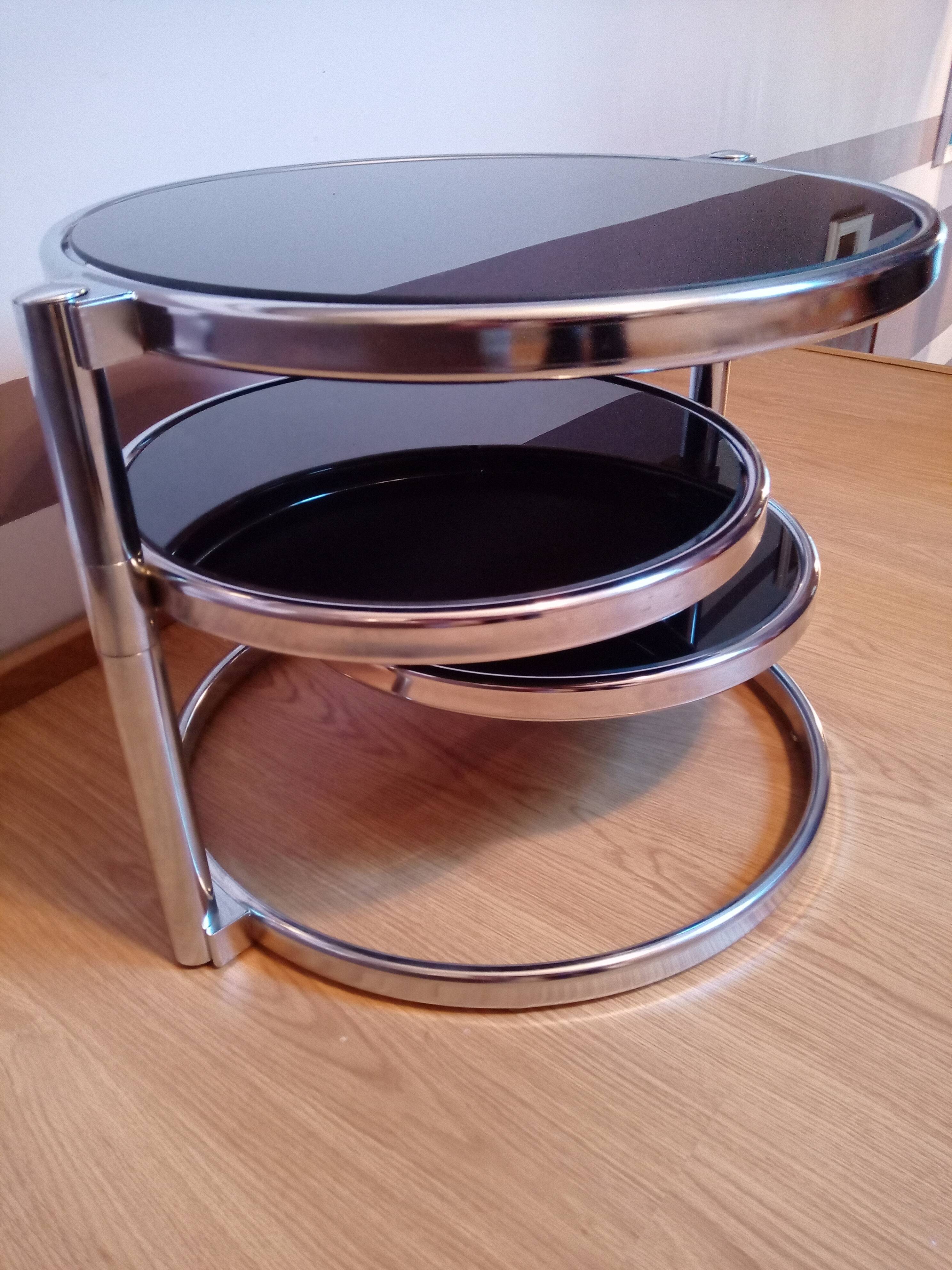 Chrome metal coffee table and swivel-tray glass