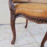 Fauteuil de bureau louis xv, sculpté, canné, garni cuir