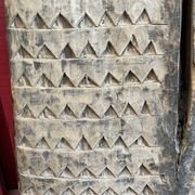 Ancient eroded wooden Tsonga Gate from the late nineteenth century, from the KwaZulu/Natal region