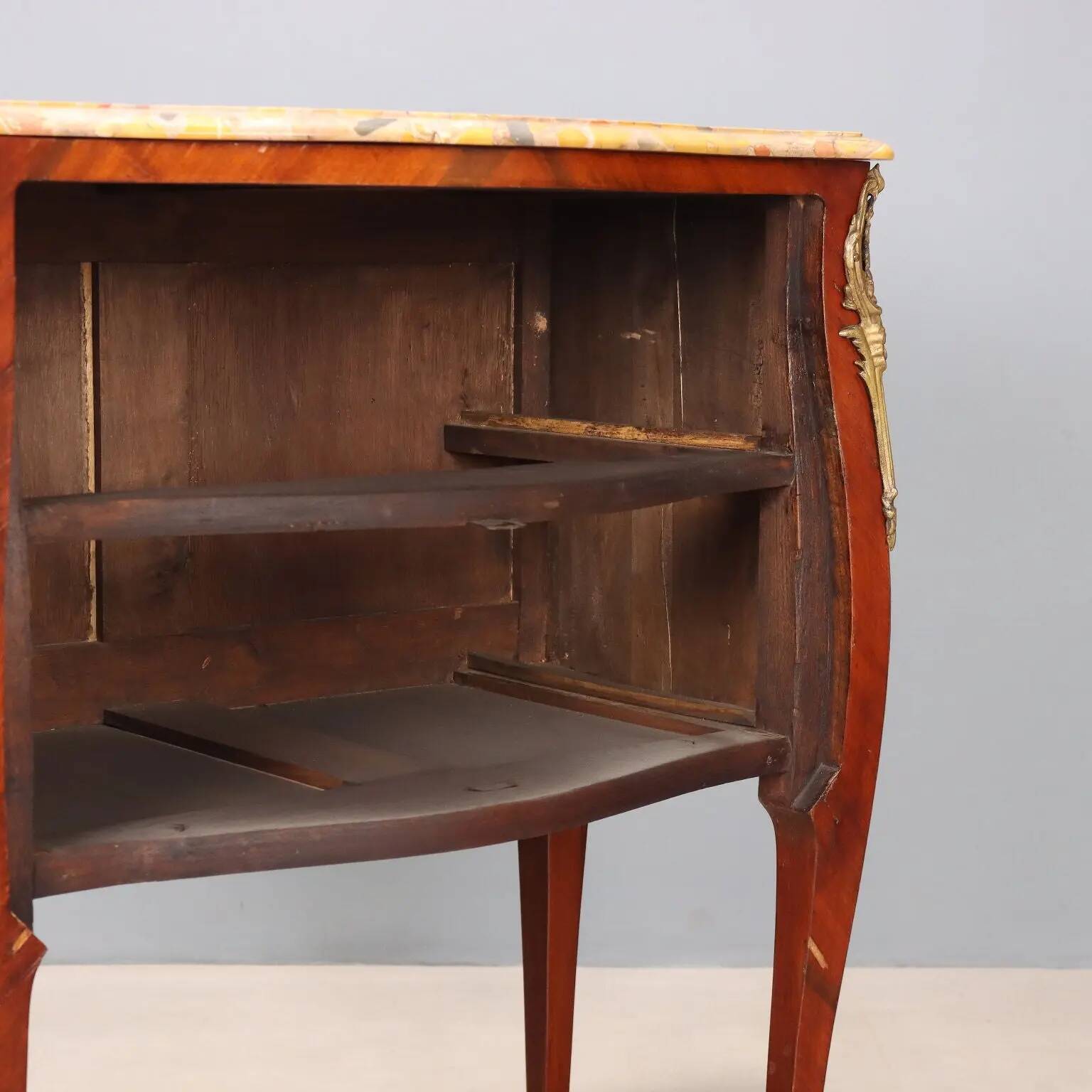 Antique commode in Baroque style made of mahogany, 20th century.