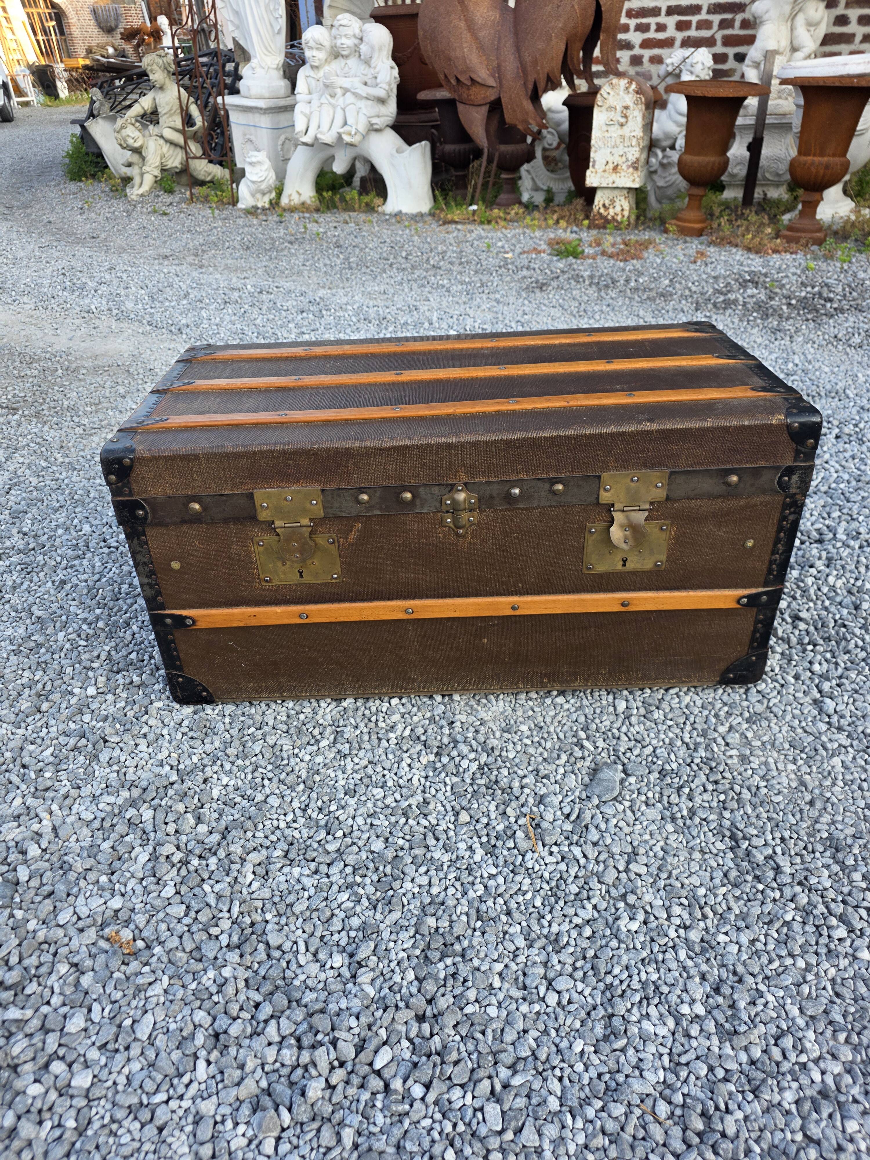 Old travel trunk in oilcloth