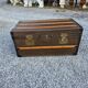 Old travel trunk in oilcloth