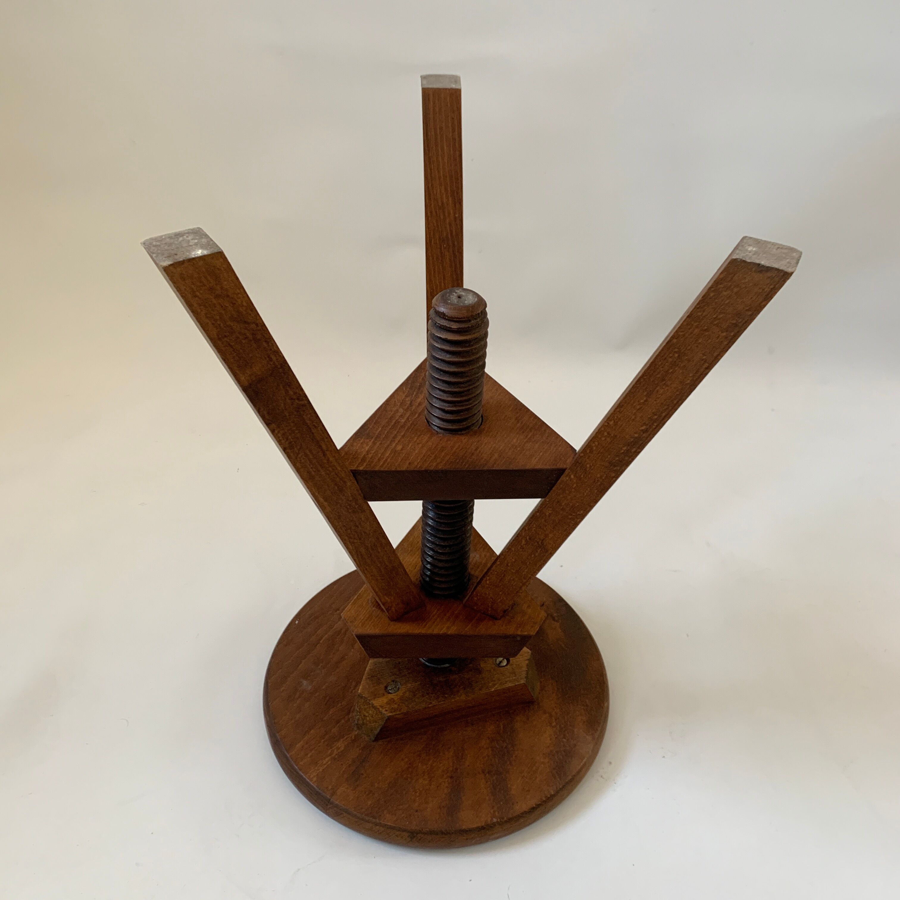Wooden tripod stool with vintage screw