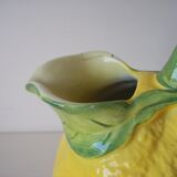 Vintage pitcher has form of lemon