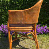 Mc Guire style armchair in rattan and caning from the 1980s.