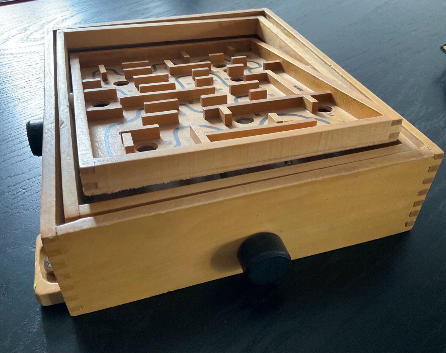 Old wooden maze game