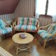 Rattan lounge with removable cushions