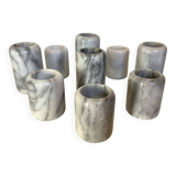 Nine marble candlesticks