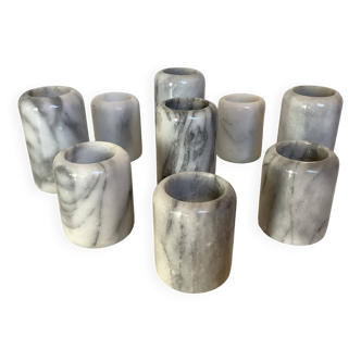 Nine marble candlesticks