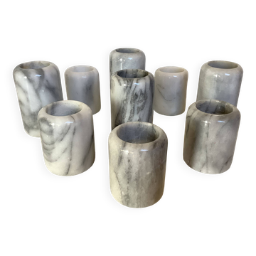 Nine marble candlesticks