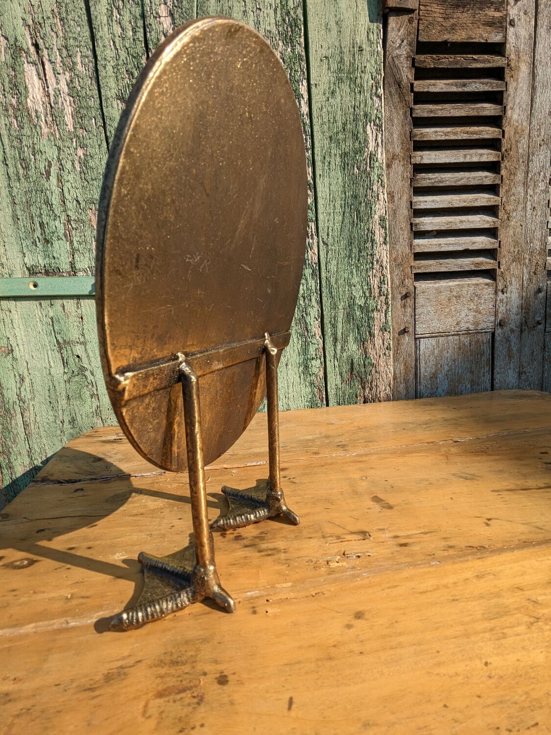 Metal mirror with duck legs
