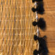 Sets de table tressés avec pompons