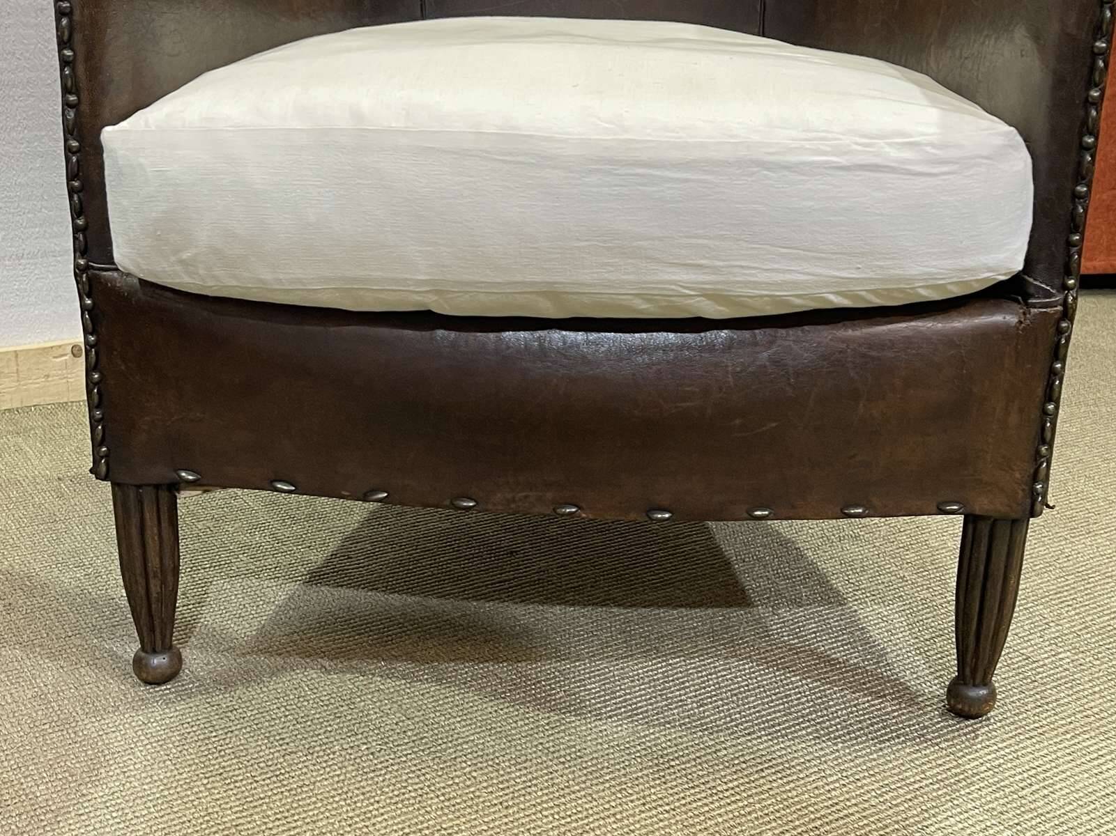 Art Deco period club lounge in leather and fabric seating