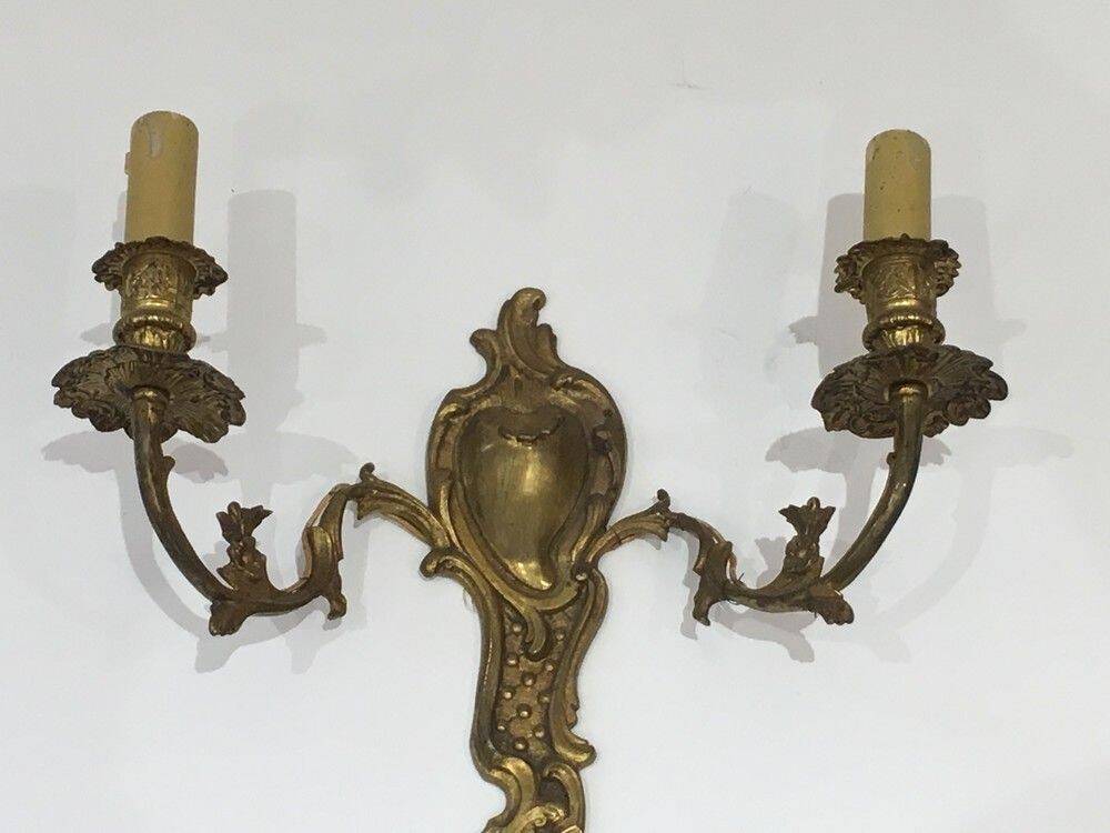 Pair of Louis XV style bronze wall sconces
