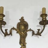 Pair of Louis XV style bronze wall sconces
