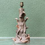 Lamp base in sculpted terracotta featuring birds, signed.