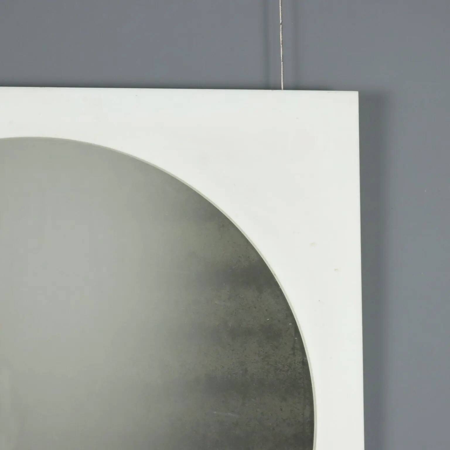 Vintage mirror in glass and perspex, Italian design from the 1970s.
