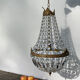 Balloon chandelier with glass crystal and brass tassels in empire style