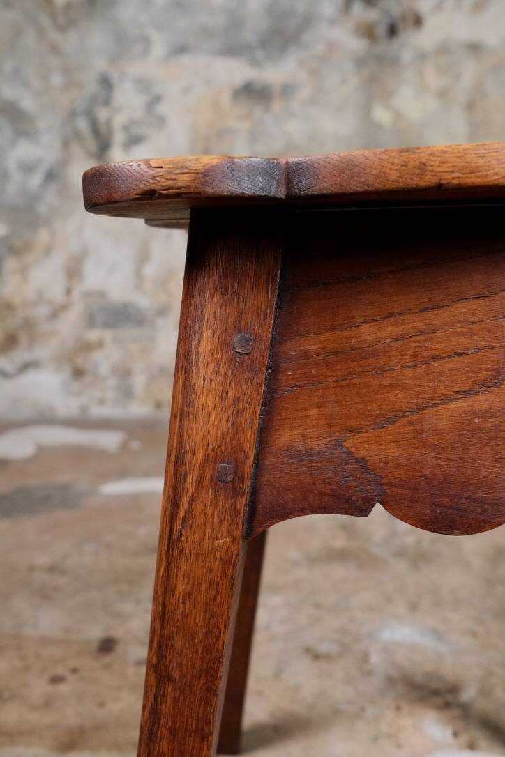 Pair of scalloped oak stools, France, early 20th century