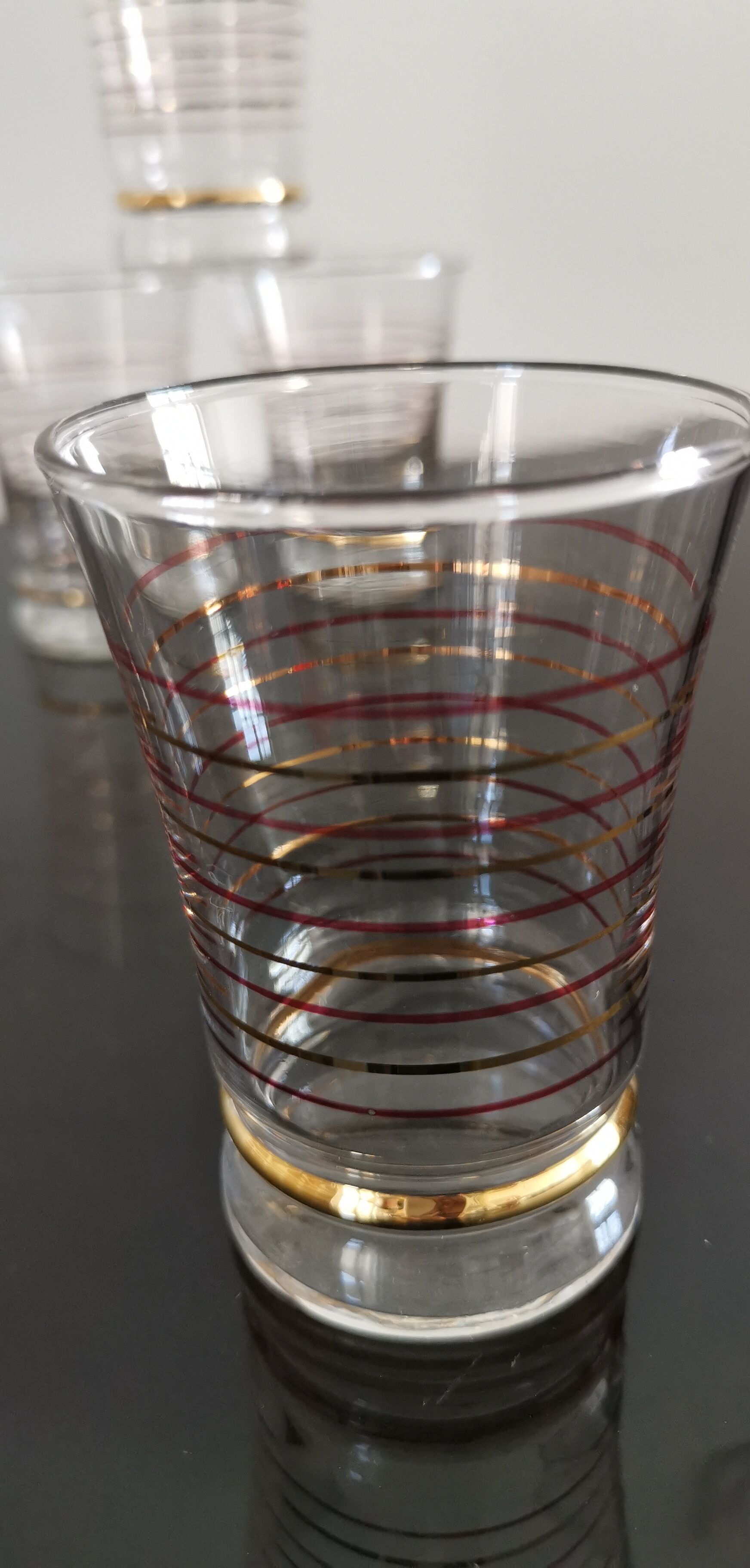 Set of 7 vintage glasses bordered gold and red years 50/60