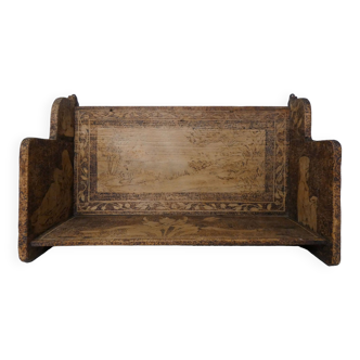 carved wooden shelf