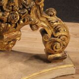 Italian lacquered and gilded round coffee table with glass top