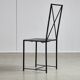 Chaise de salle à manger italienne postmoderne en cuir noir en forme de « X », années 1980