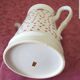 Flowered teapot, made in Korea.