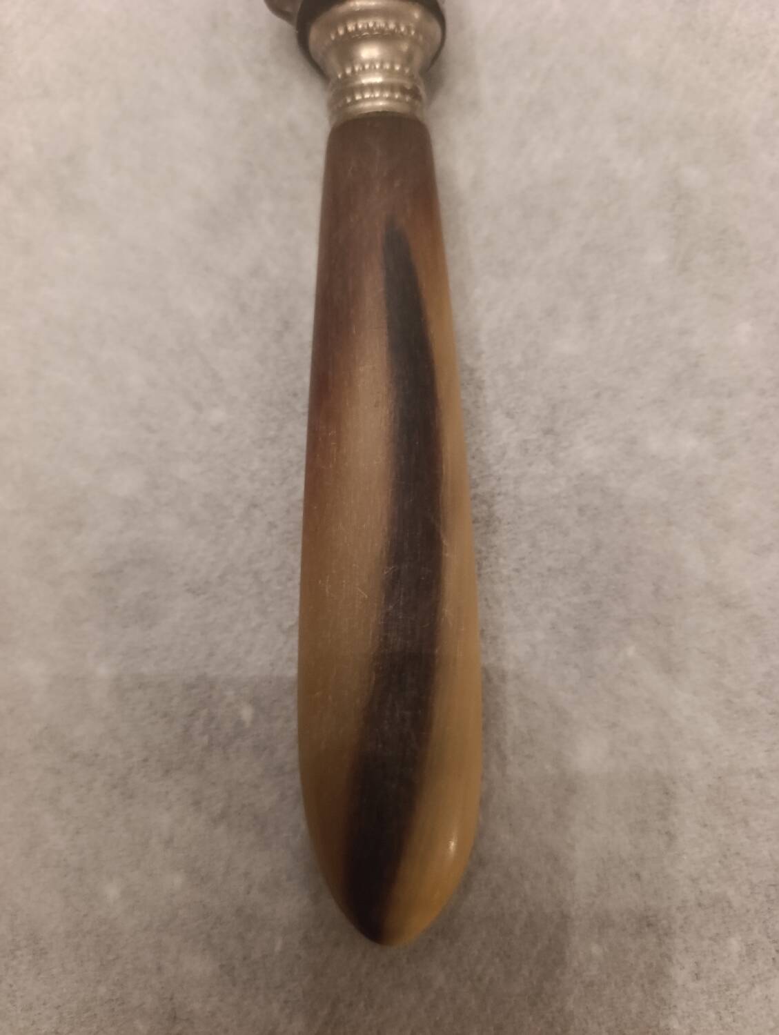 Knife with a horn handle