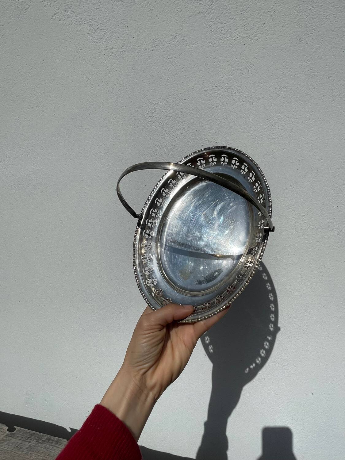 Oval dish with silver-plated metal handle
