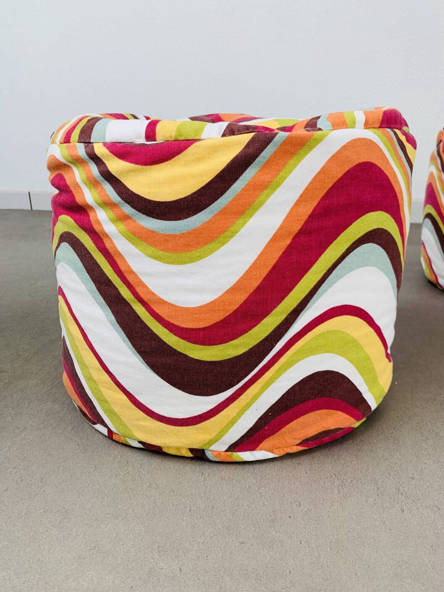 Pair of "psychedelic" fabric poufs from the 70s.