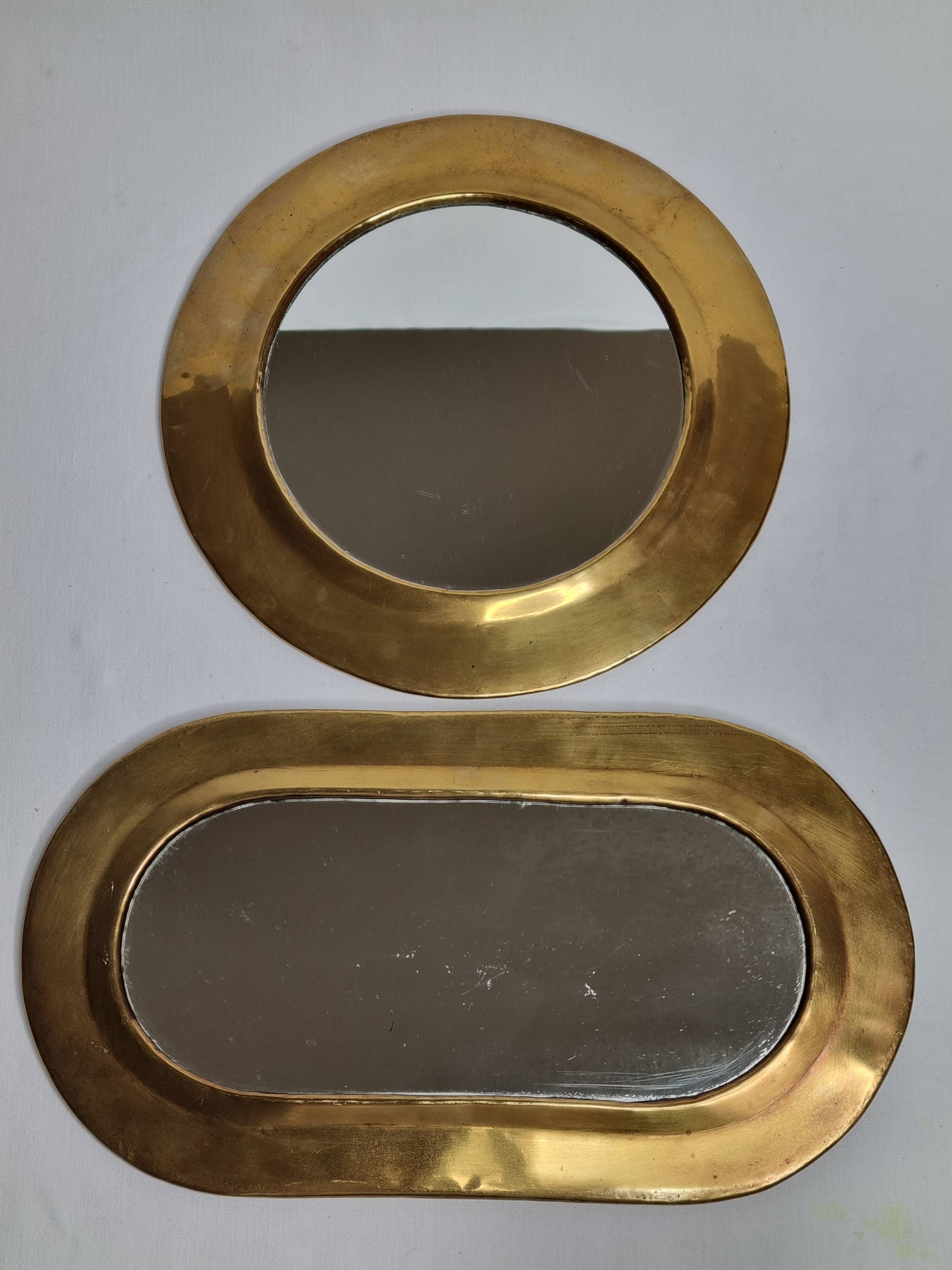 Set of three antique Moroccan brass mirrors, 32 cm