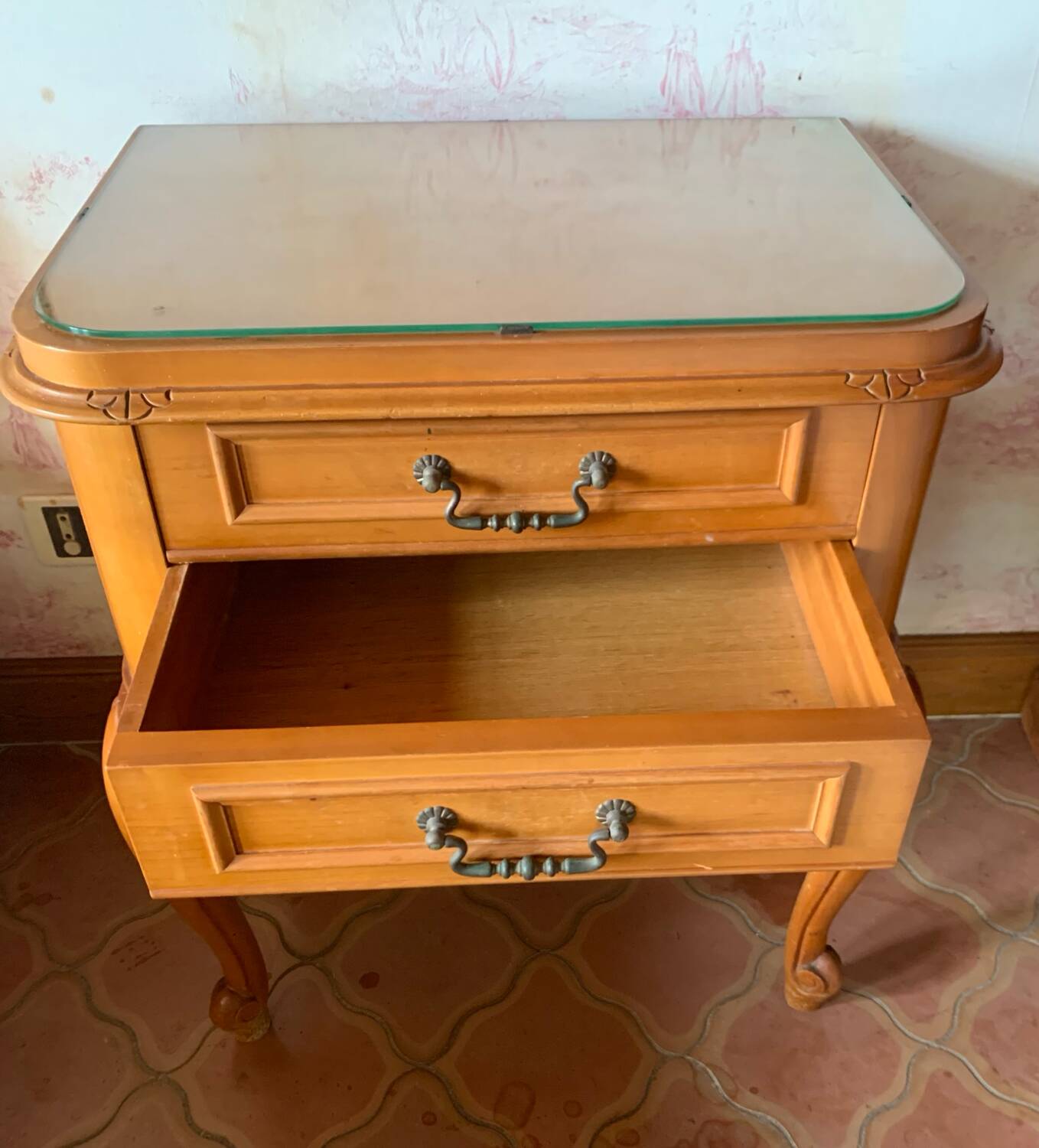 Classic carved cherry bedside table with glass top