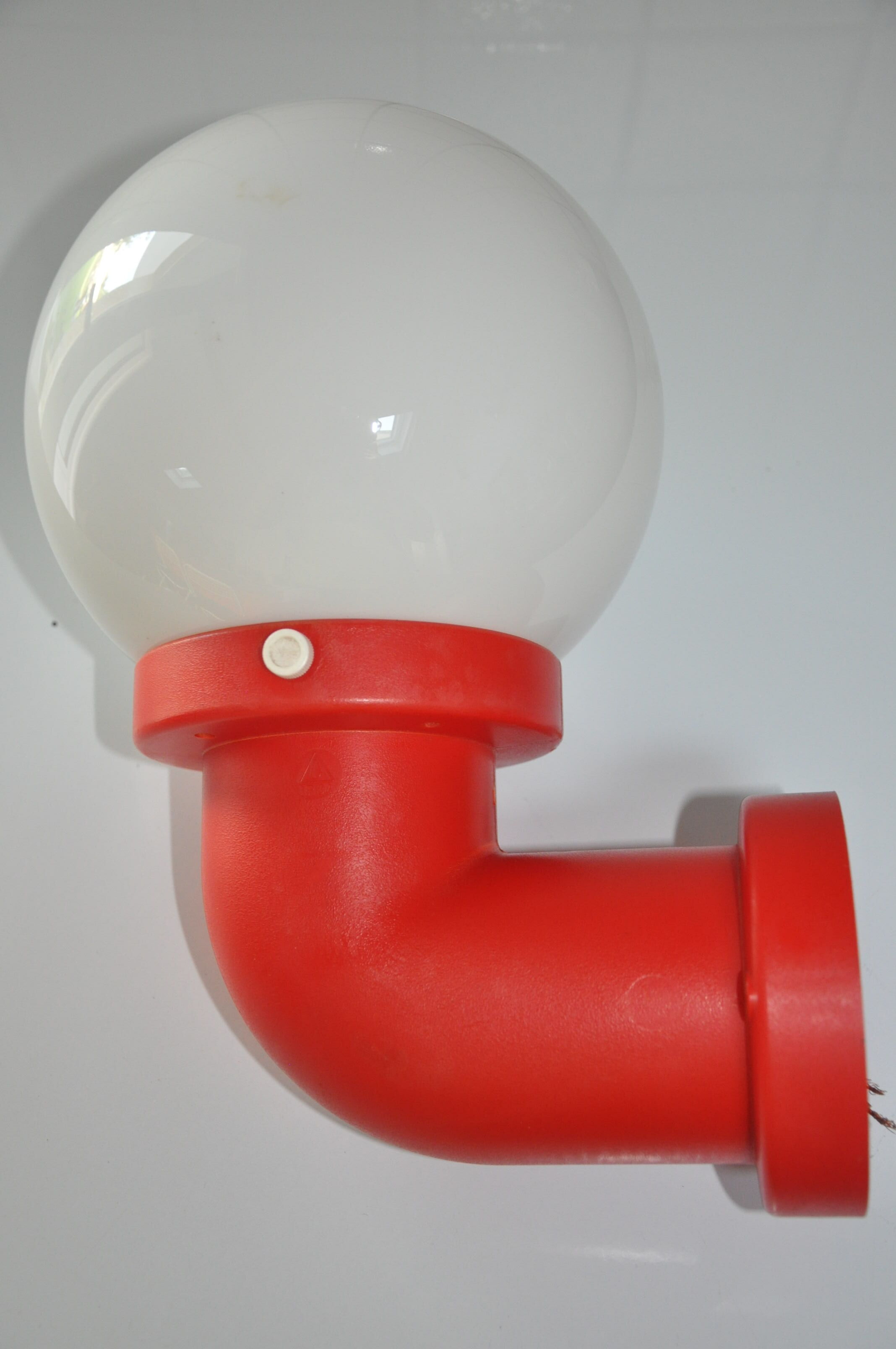 Danish wall light design indus red pipe