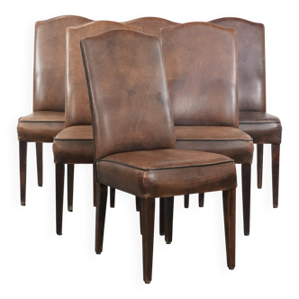 Set of 6 vintage sheepskin dining chairs finished with black piping