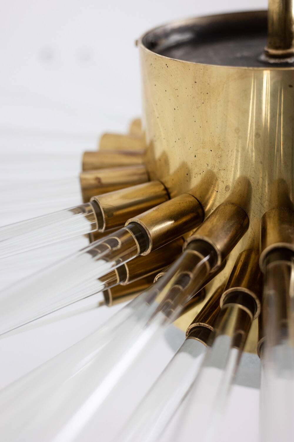 Radiant glass tube chandelier. Contemporary design.