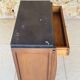 Art Deco bedside table in walnut, black marble top, circa 1920.