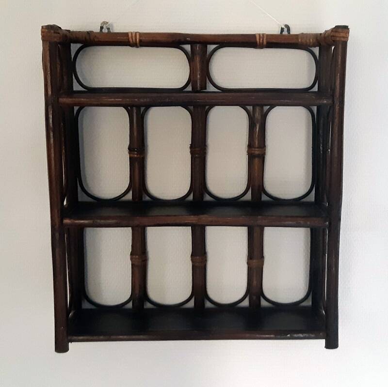 Rattan wall shelf from the 70s.
