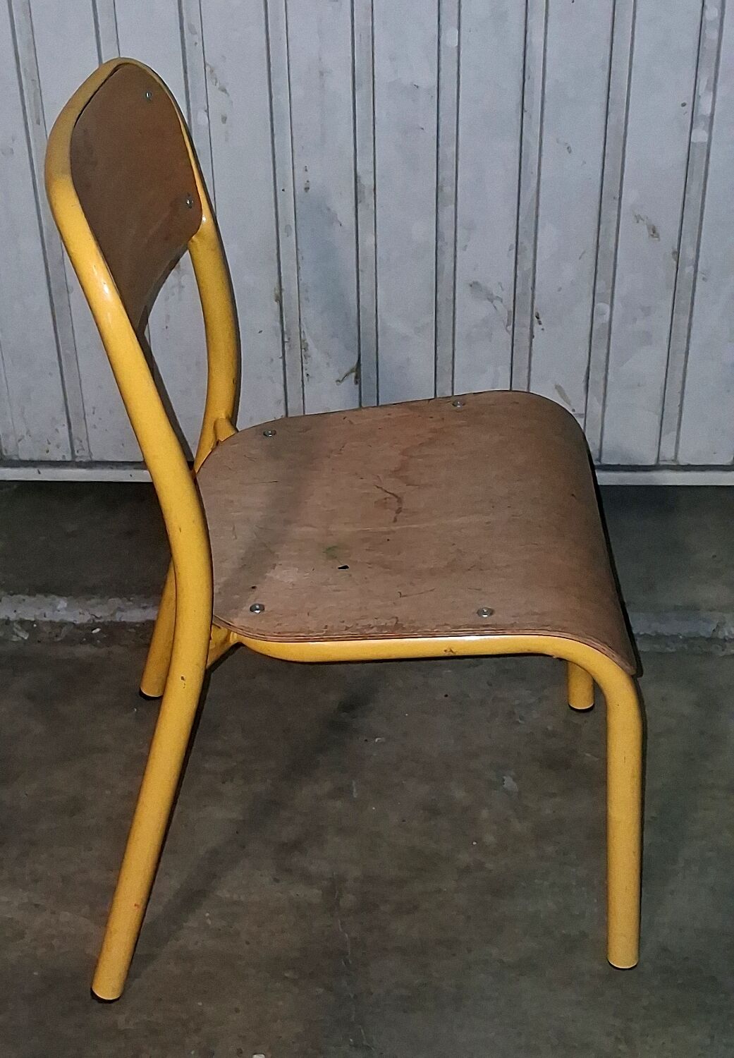 Pair of school chairs, wood and yellow metal, industrial decor.