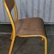 Pair of school chairs, wood and yellow metal, industrial decor.