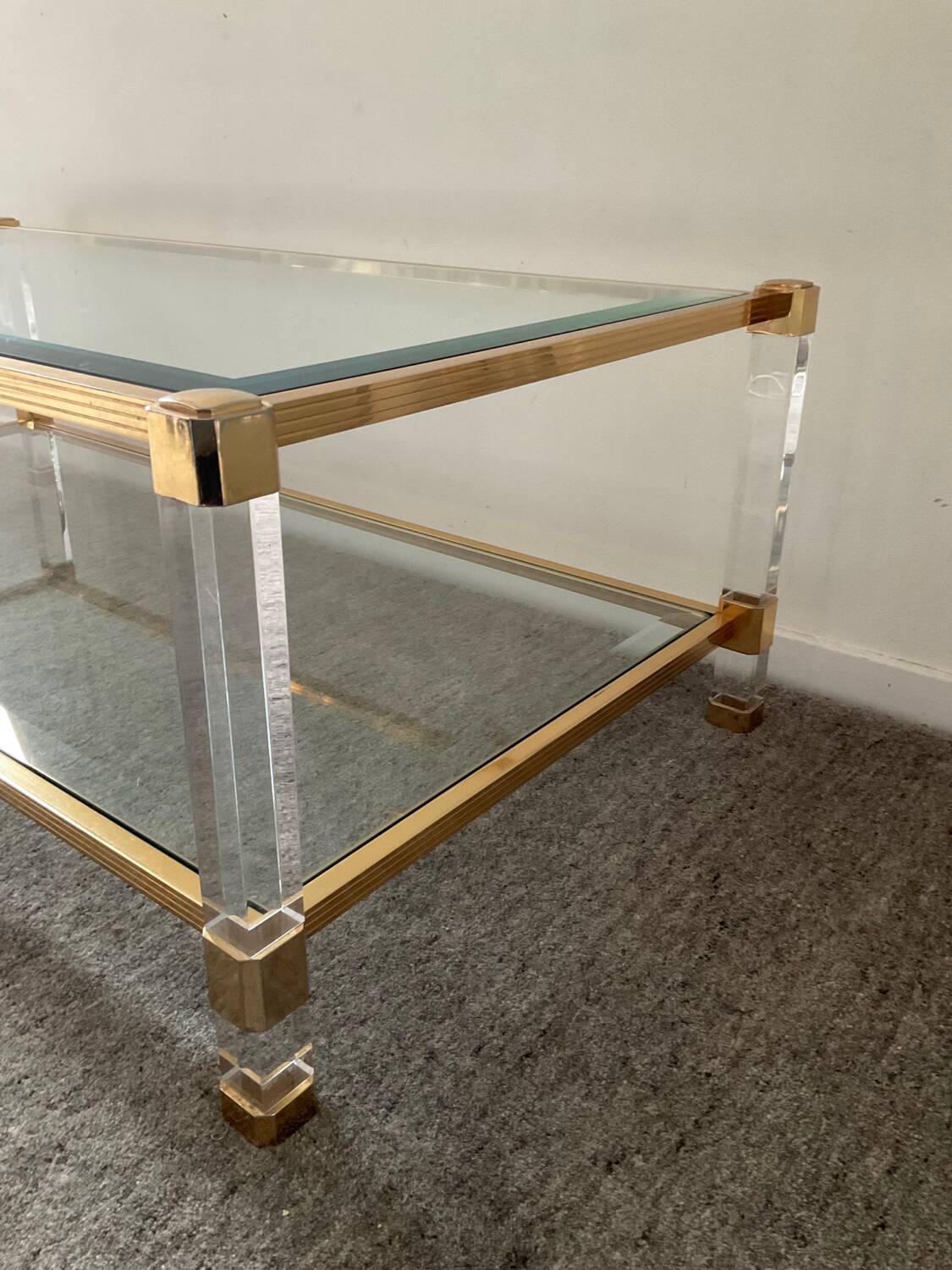 Vintage lucite and brass coffee table from the 70s