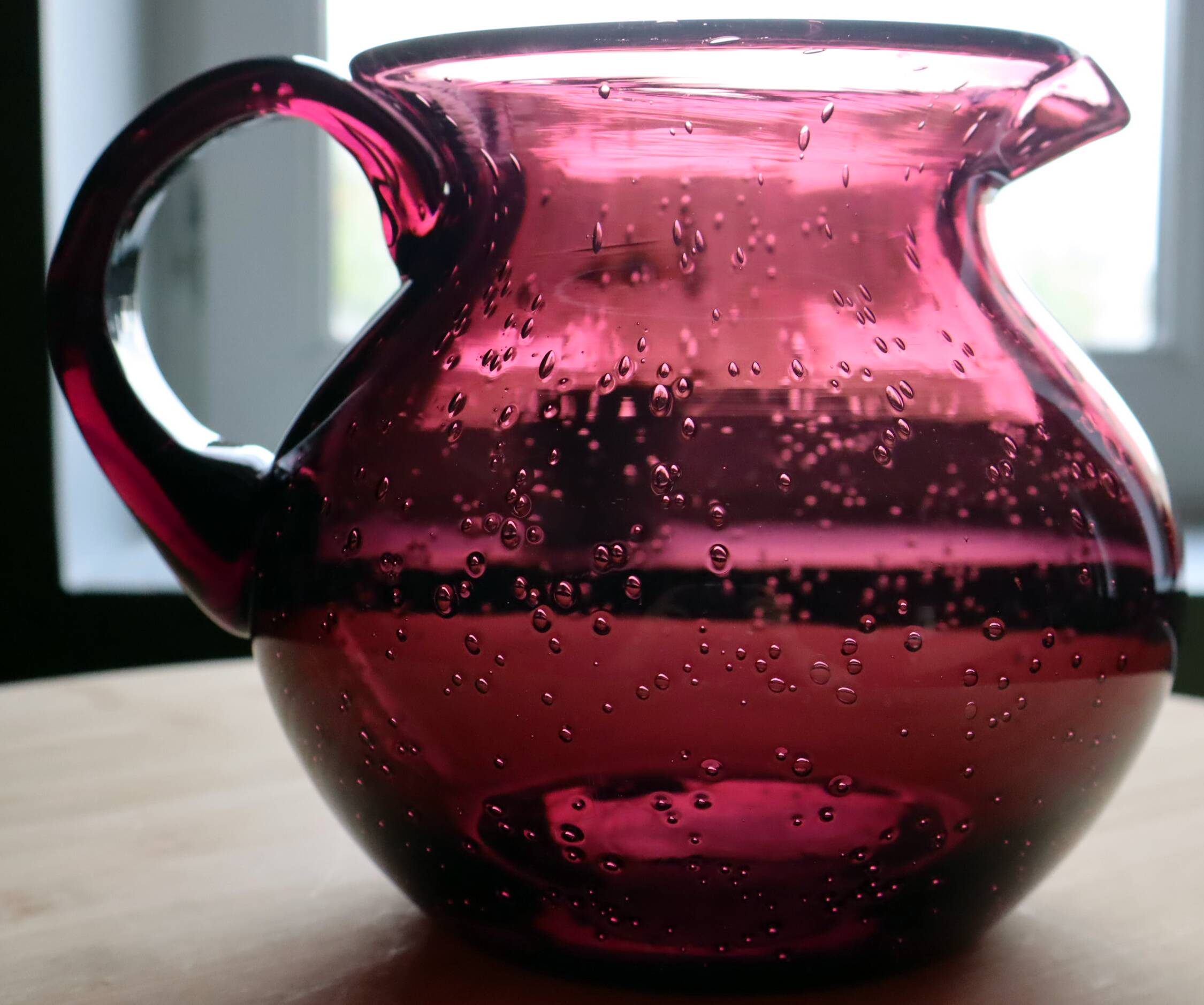 Large blown glass pitcher with bubbles in amethyst / violet.