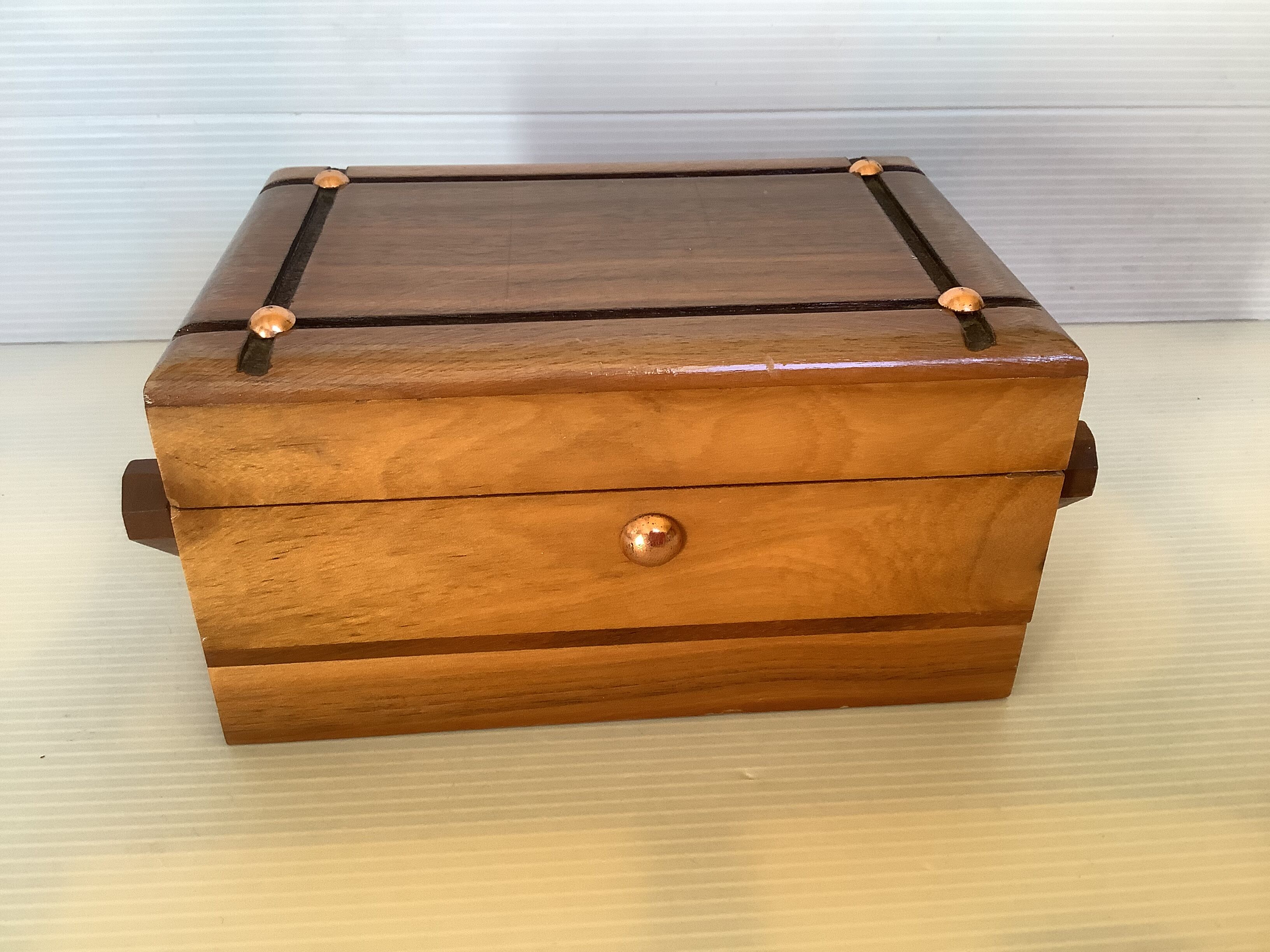 Old wooden cigarette box and ashtray