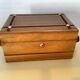 Old wooden cigarette box and ashtray