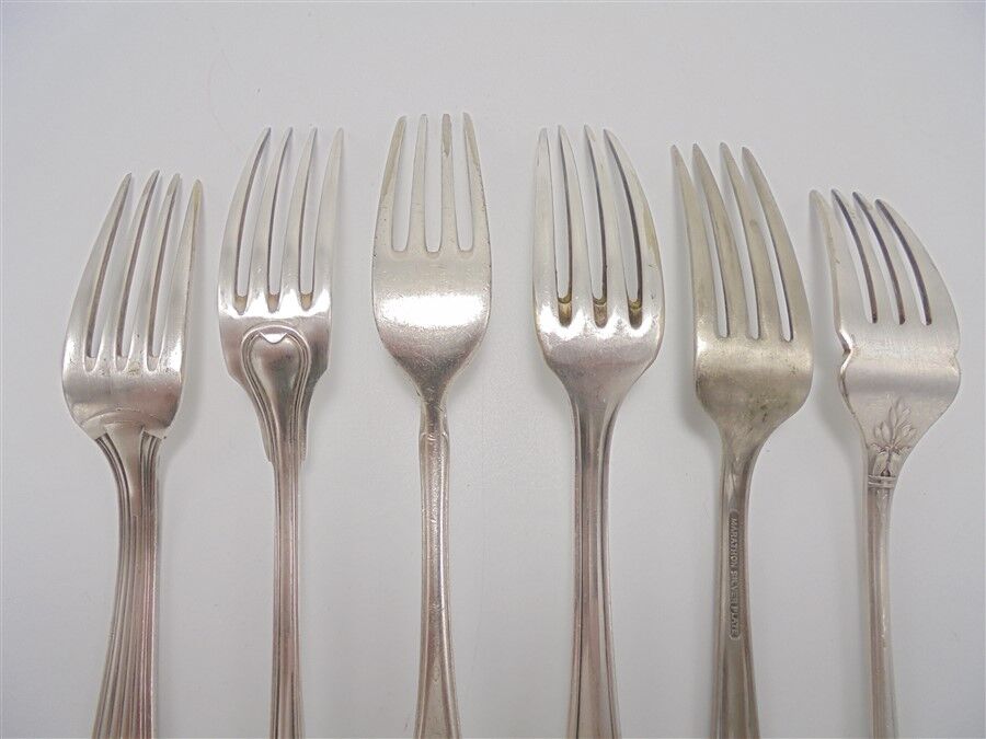 6 old mismatched forks