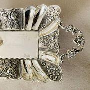 St Louis XV style letter tray, empty pocket, 20th century, in repoussé metal.