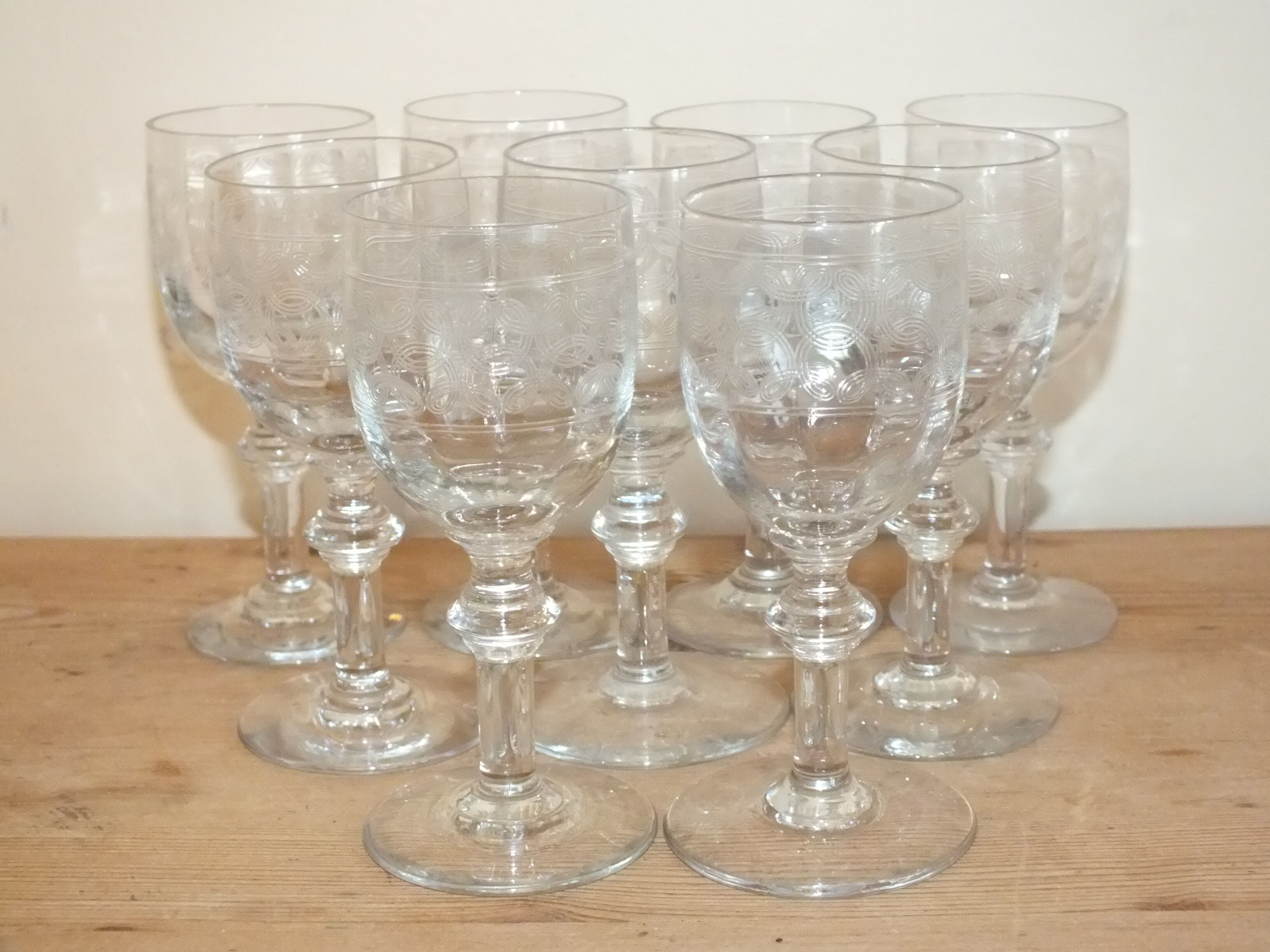 9 antique glasses in port or alcohol decorated with arabesques