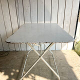 White folding metal bistro table